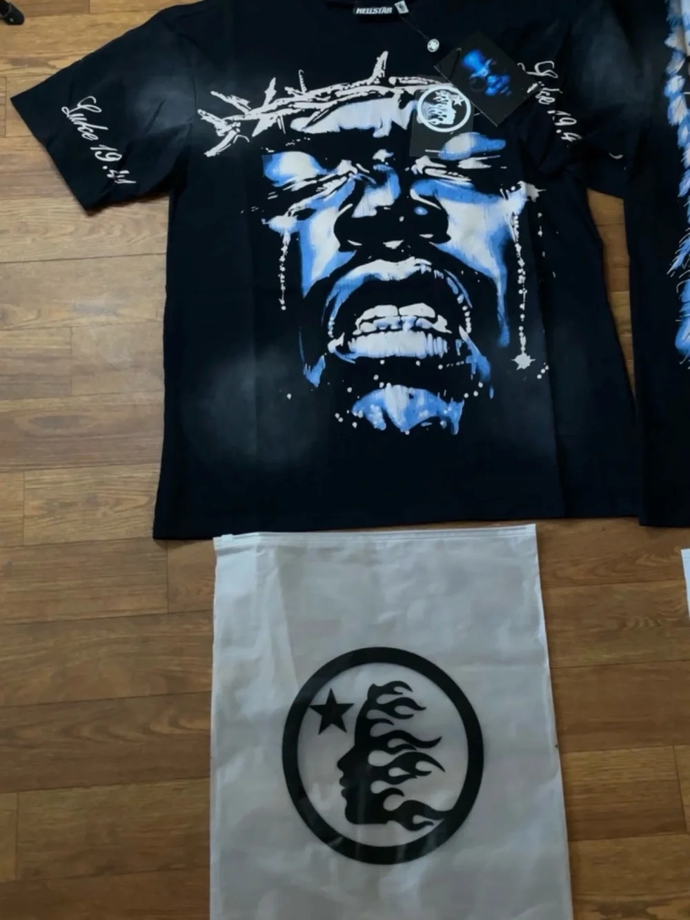 Hellstar Men’s Black Graphic Tee with Blue Face Print